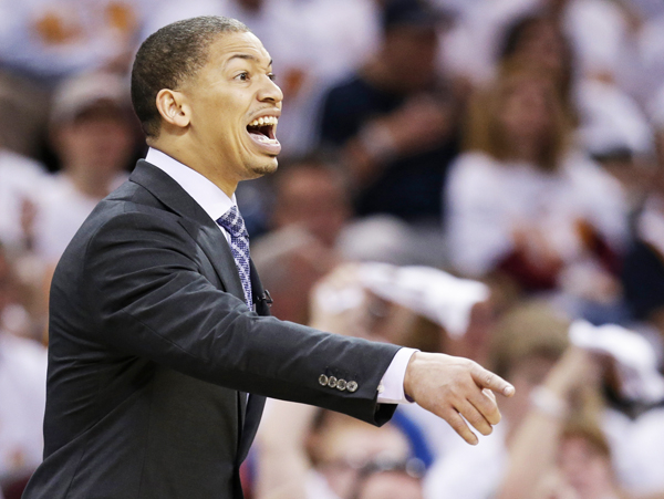 Cleveland Cavaliers head coach Tyronn Lue yells to players in the second half in Game 1 of a first-round NBA basketball playoff series against the Detroit Pistons, Sunday, April 17, 2016, in Cleveland. (AP Photo/Tony Dejak)